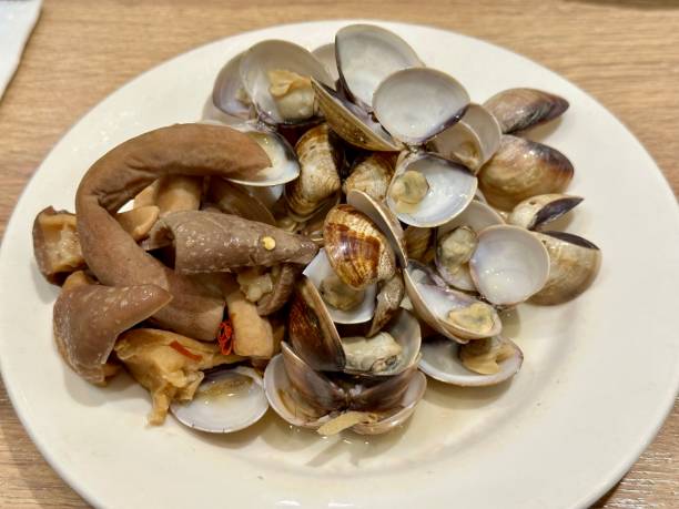 istock Pork intestines and clams, ready to serve 1914845259