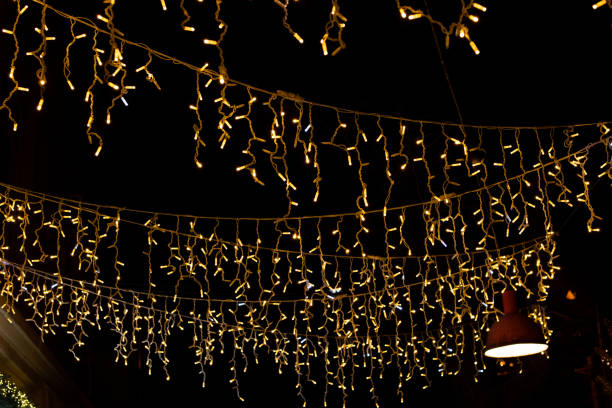 istock Festive Glow: Magical Christmas Lights Illuminate the Holiday Darkness 1914851990