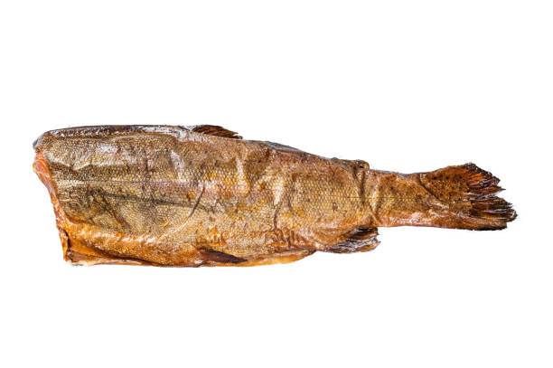 Smoked fish on a wooden plate