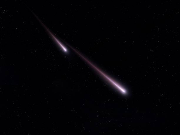 istock Meteors on a black background. Falling meteorites isolated. 1914869244