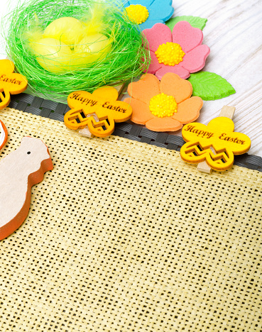 Easter eggs on a burlap background. Easter decoration. Place for text.