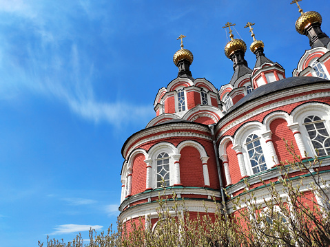 Kimry, Tver region, Russia  May 6, 2021: Spaso-Preobrazhensky Cathedral ( Transfiguration ), orthodox church, against the blue sky on a sunny day in a small provincial town. Copy space