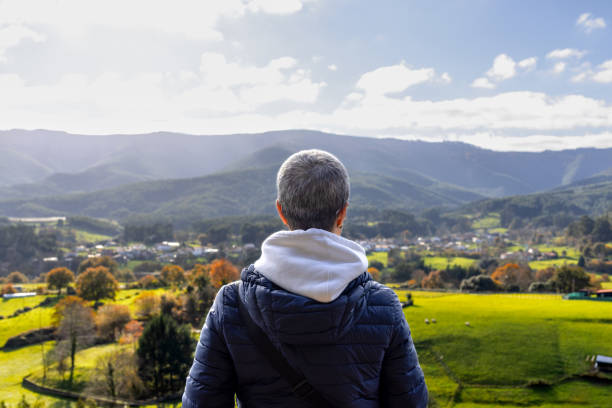 Mature woman enjoying scenic fall view