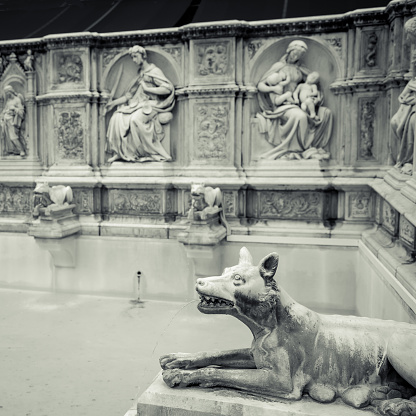 A detail of the 14th century monumental fountain called Fonte Gaia in the main square of Siena, Tuscany, Italy