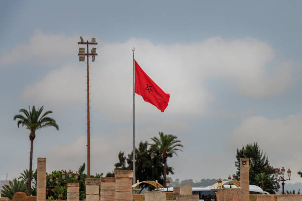 istock State flag. King Mohammed V Mausoleum, Hassan Tower in Rabat Morocco. 1915074706