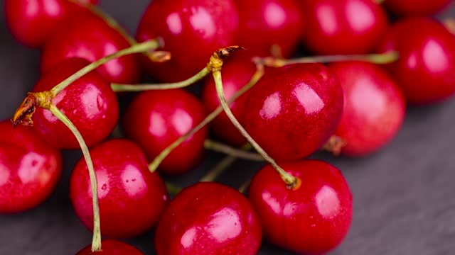 delicious sweet cherries on a slate board