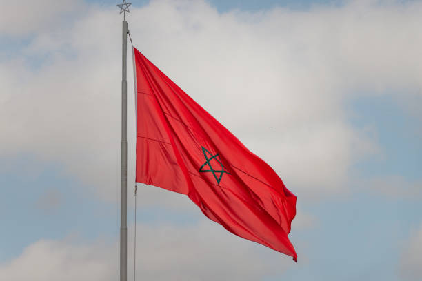 istock State flag. King Mohammed V Mausoleum, Hassan Tower in Rabat Morocco. 1915077875