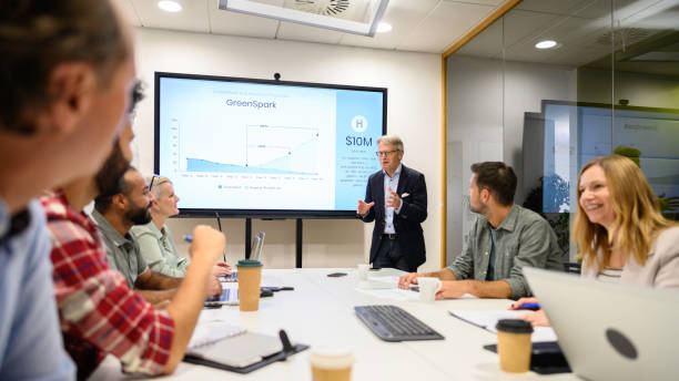istock Man giving presentation in meeting room 1915184829