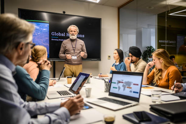 istock Man giving presentation in meeting room 1915184836