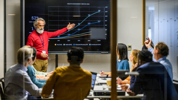 istock Man giving presentation in meeting room 1915184838