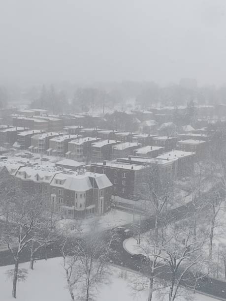 istock Snow on rooftops in the city 1915189496