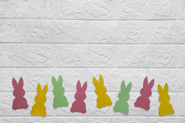 istock Children's decor from colored rabbits for room. 1915207551