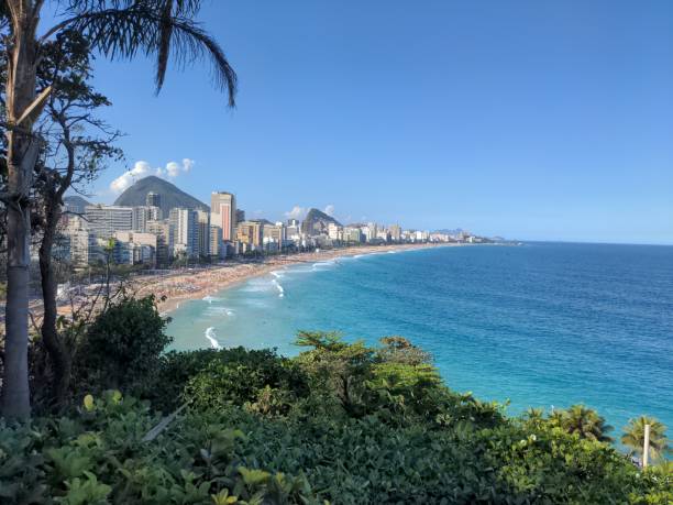 istock the beautiful beach and skyline from a hill by the water 1915342537