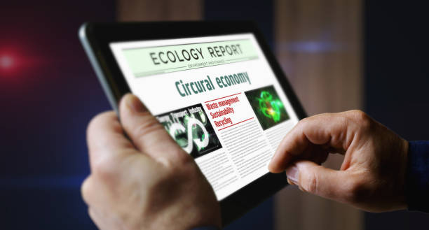 istock Circular economy newspaper on mobile tablet screen 1915364345