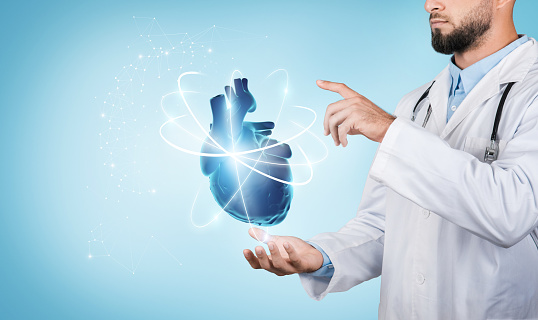 Doctor in white lab coat and stethoscope showcases floating 3D holographic heart with glowing connections and paths, on serene blue background, symbolizing advanced medical technology