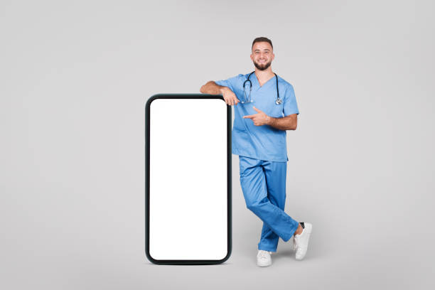 Doctor pointing at large blank smartphone screen