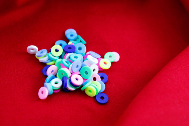 Polymer clay beads of diferent colors forming a star