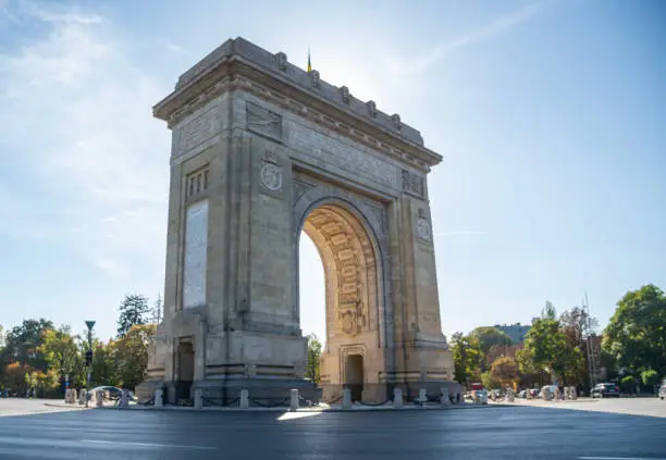 Photo of The Arc de Triomphe (in Roumain, Arcul de Triumf) is a monument located in the city of Bucharest, capital of Roumanie.