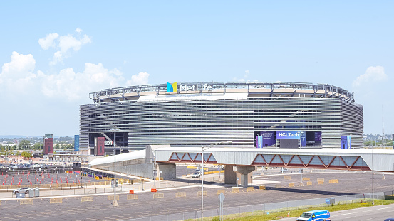 Houston, United States - April 13, 2023:  Aerial view of both the NRG Stadium, home to the NFL's Houston Texans, and the historic Astrodome, the first indoor sports arena, now listed as a historic site shot from an altitude of about 600 feet overhead during a helicopter photo flight.