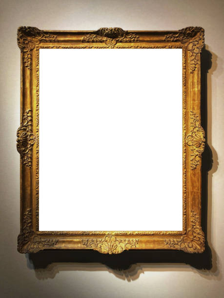 istock elegant wooden picture frames hanging on the wall 1915544018