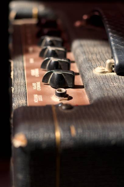 istock top view of an antique guitar amplifier, knobs and handle 1915578140