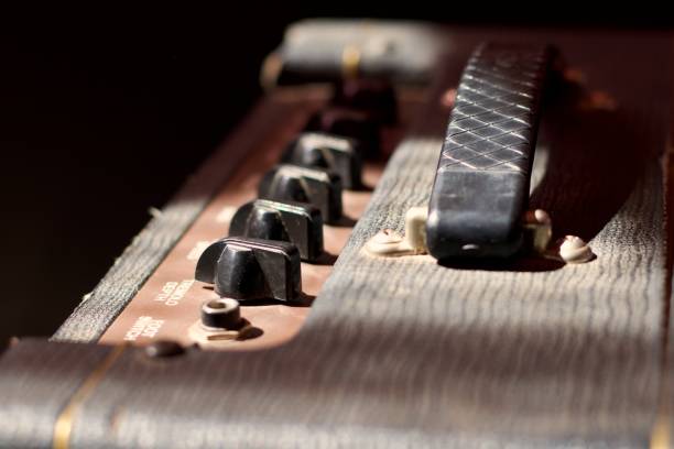 istock top view of an antique guitar amplifier, knobs and handle 1915578651