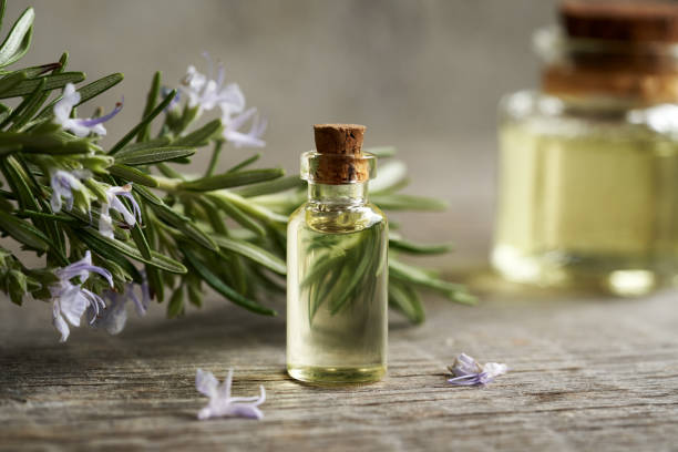 istock Rosemary essential oil in a glass bottle 1915591604