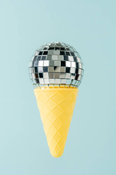 istock Disco ball ice cream on bright blue background. Minimal party concept. 1915604473