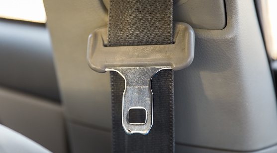 car seatbelt, safety device in vehicle, symbolic protection and security