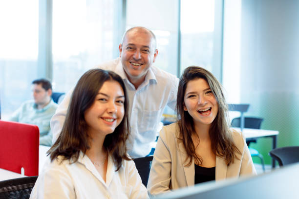istock Dynamic Leadership in a Modern Open Office: Happy CEO and Creative Team 1915742232