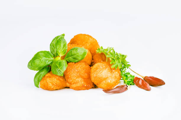 istock Breaded Chicken Inner Fillet on a White Background,Chicken Breaded Raw Meat.Chicken Breaded Fillet. Breaded chicken nuggets. Fast homemade food at home. Chicken breaded schnitzels. Fast cooking. 1915836042