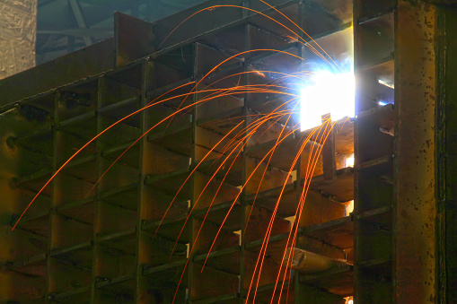 electric spark in a welding scene, closeup of photo