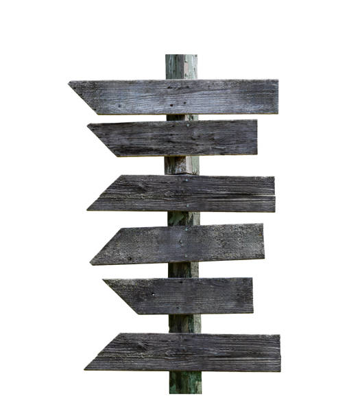 istock Old weathered wood blank directional sign post isolated cutout 1915914468