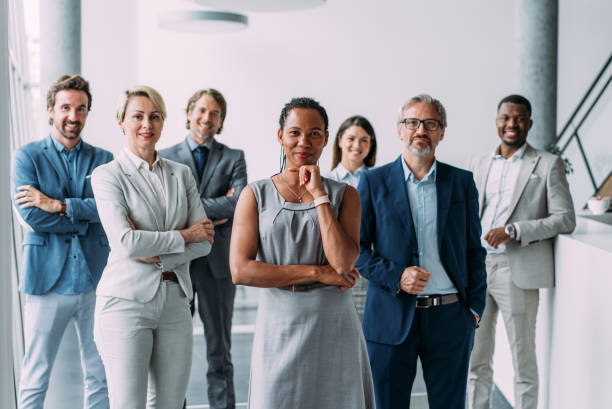 istock Confident businesswoman and her team. 1915928171