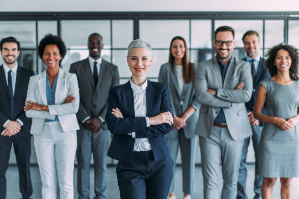 istock Confident businesswoman and her team. 1915928756