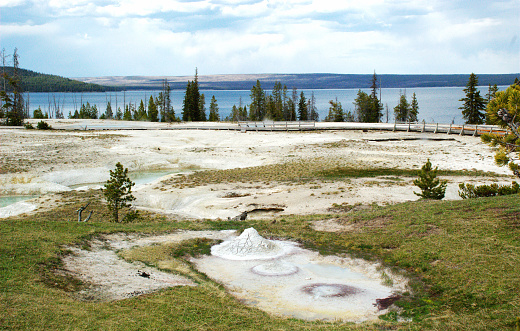 Spectacular panoramic views of West Thumb Geyser Basin in Yellowstone National Park, Wyoming Montana. Yellowstone Lake. Great hiking. Summer wonderland to watch wildlife and natural landscape. Geothermal.