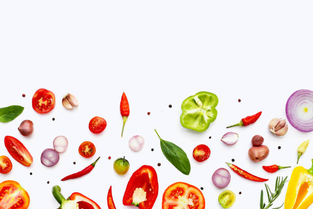 istock Various fresh vegetables and herbs on white background. 1916035115