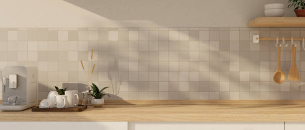 istock Empty mockup space on a wooden kitchen countertop with an espresso machine on the counter. 1916062149