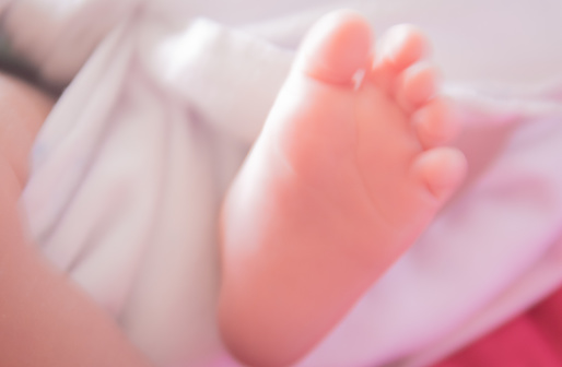 cute baby hands and feet love mother