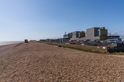 Dungeness, Kent, England, UK - May 12, 2022: The pebble beach and Dungeness Power Station