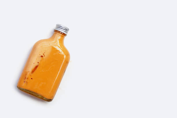 istock Ice Thai tea with milk on white background. 1916230728