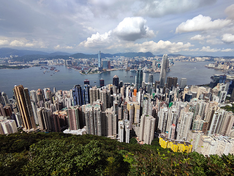 Hong Kong cityscape and Victoria Harbour, viewed from lugard road on the famous Victoria Peak.