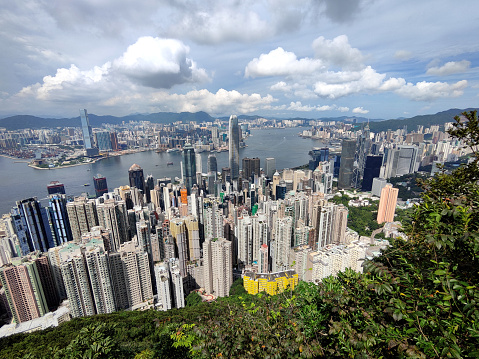 Hong Kong cityscape and Victoria Harbour, viewed from lugard road on the famous Victoria Peak.