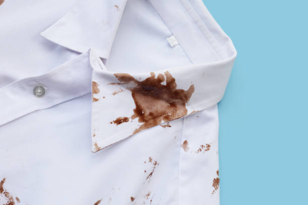 istock Dirty choclate stain on white shirt 1916286296