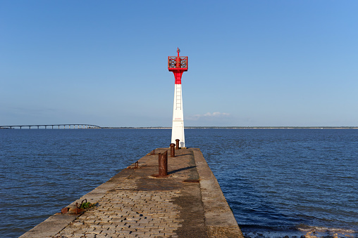 Lighthouse of the Plomb harbor and bridge of  Ré in Charente Maritime coast