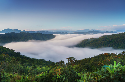 Morning mist with green mountains at Huai Kub Kab, Mae Taeng, Chiang Mai, Thailand.