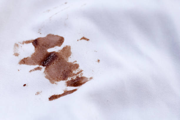 istock Dirty choclate stain on white shirt 1916363831