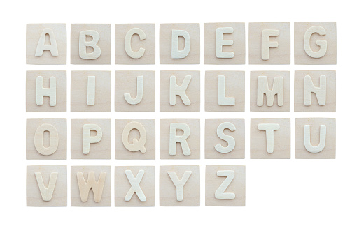 Wooden alphabet letter blocks isolated on white background with clipping path.