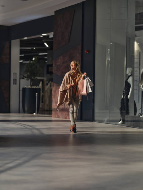 Portrait of beautiful teenage girl in shopping mall