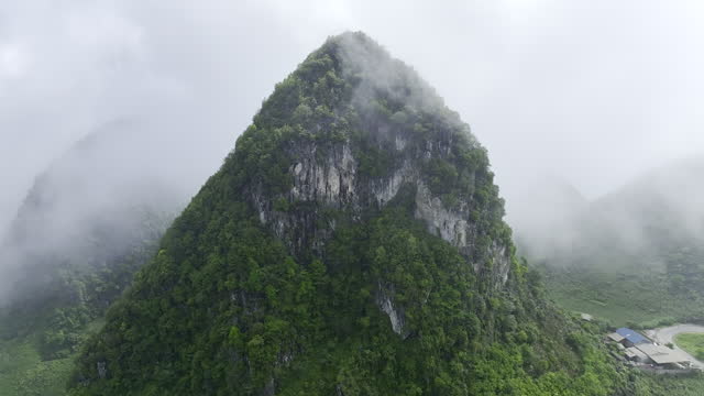 Aerial Drone Footage Of Mountain Among The Clouds In Northern Vietnam Near Chinese Border